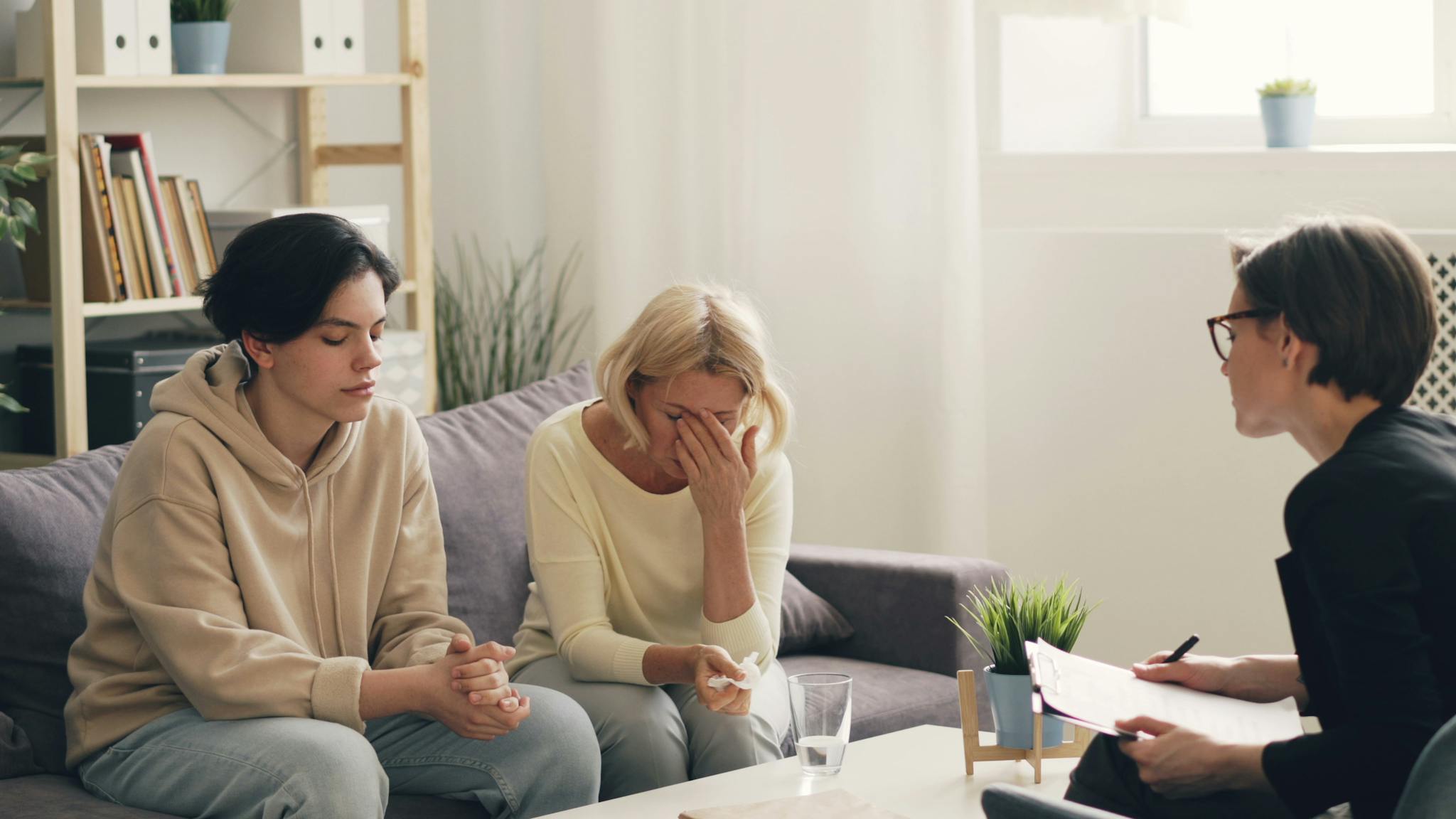 emotional family therapy session with a therapist