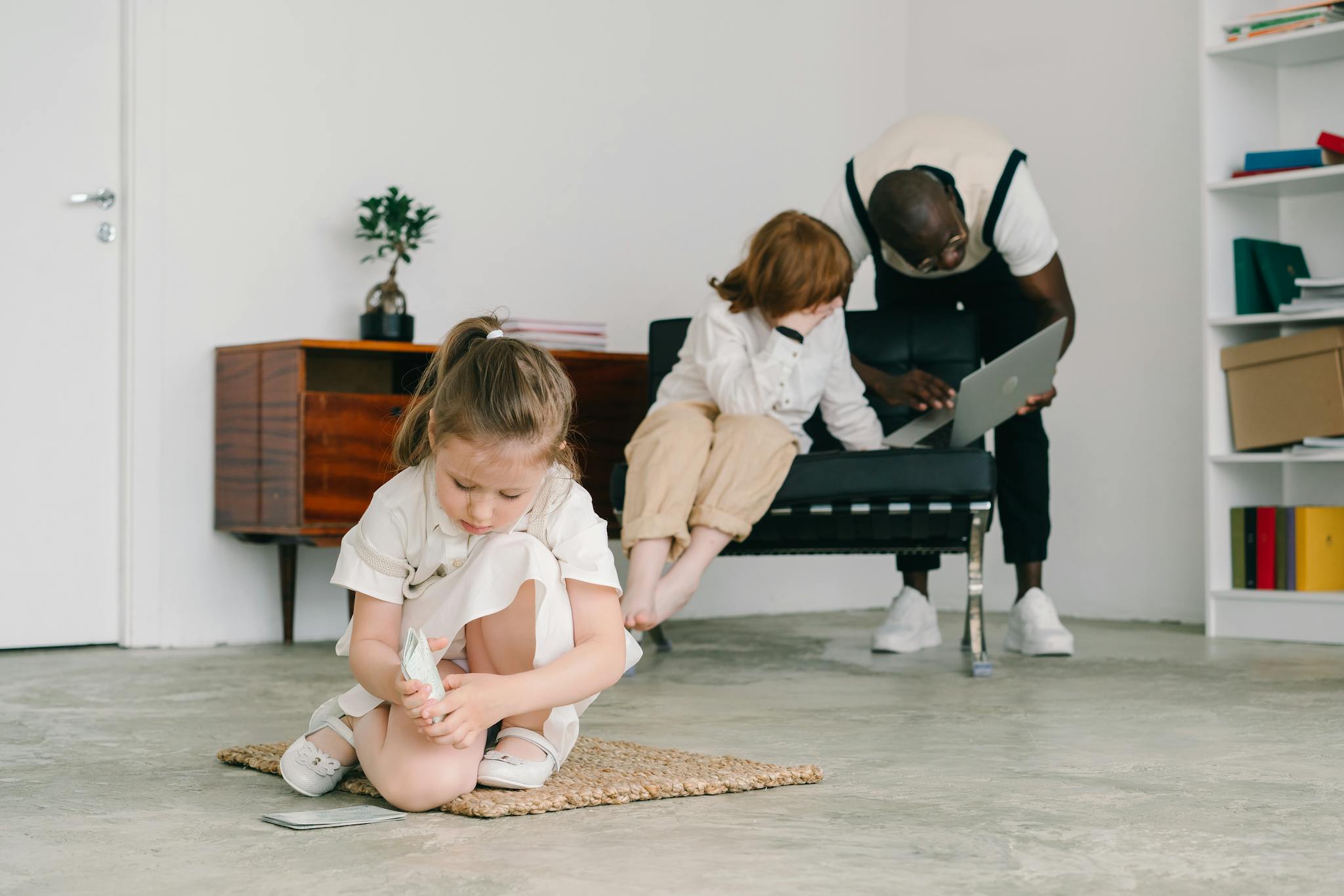 young girl engaged in play therapy with